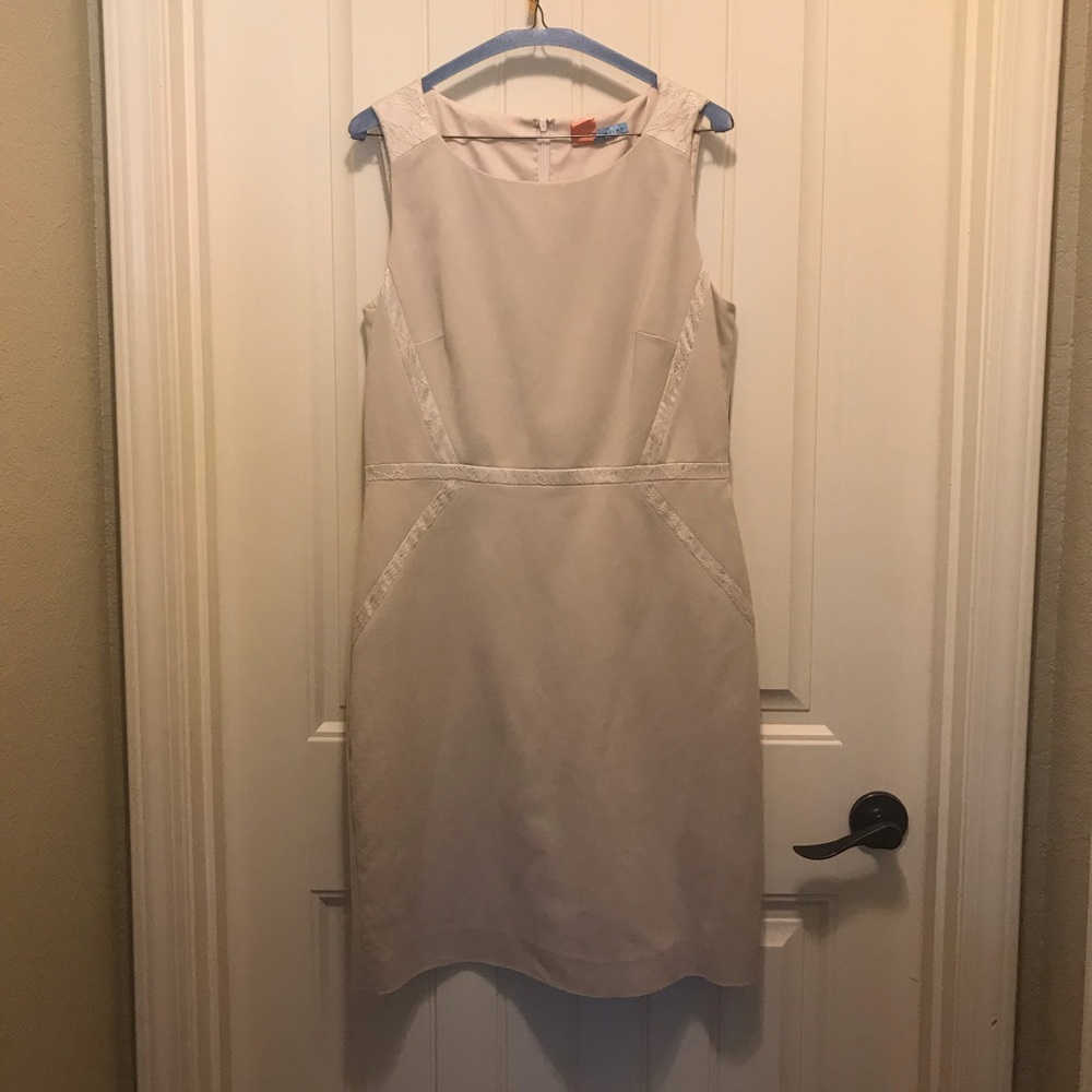 A Melani cream dress with gorgeous lace detailing.